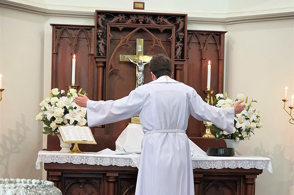 Pastor Chris at the altar